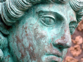 This is a macro photo of Roman statuary at the ancient ruins of Pompeii.